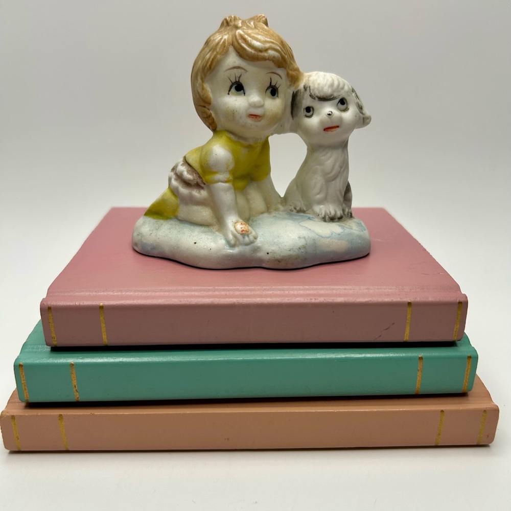 Vintage girl and dog figurine